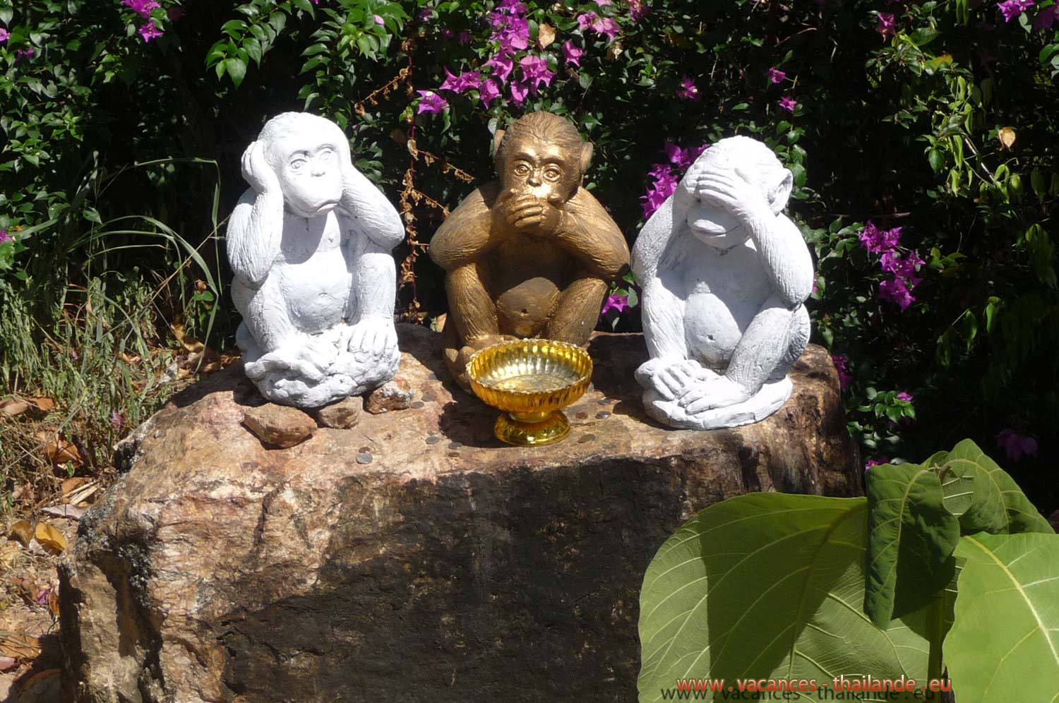 hree wise monkeys in very beautiful Buddhist temples in Thailand
